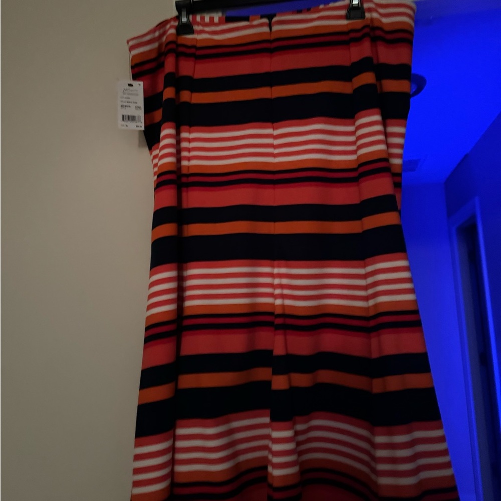 A colorful, striped XL NY Collection misses skirt with bold horizontal patterns